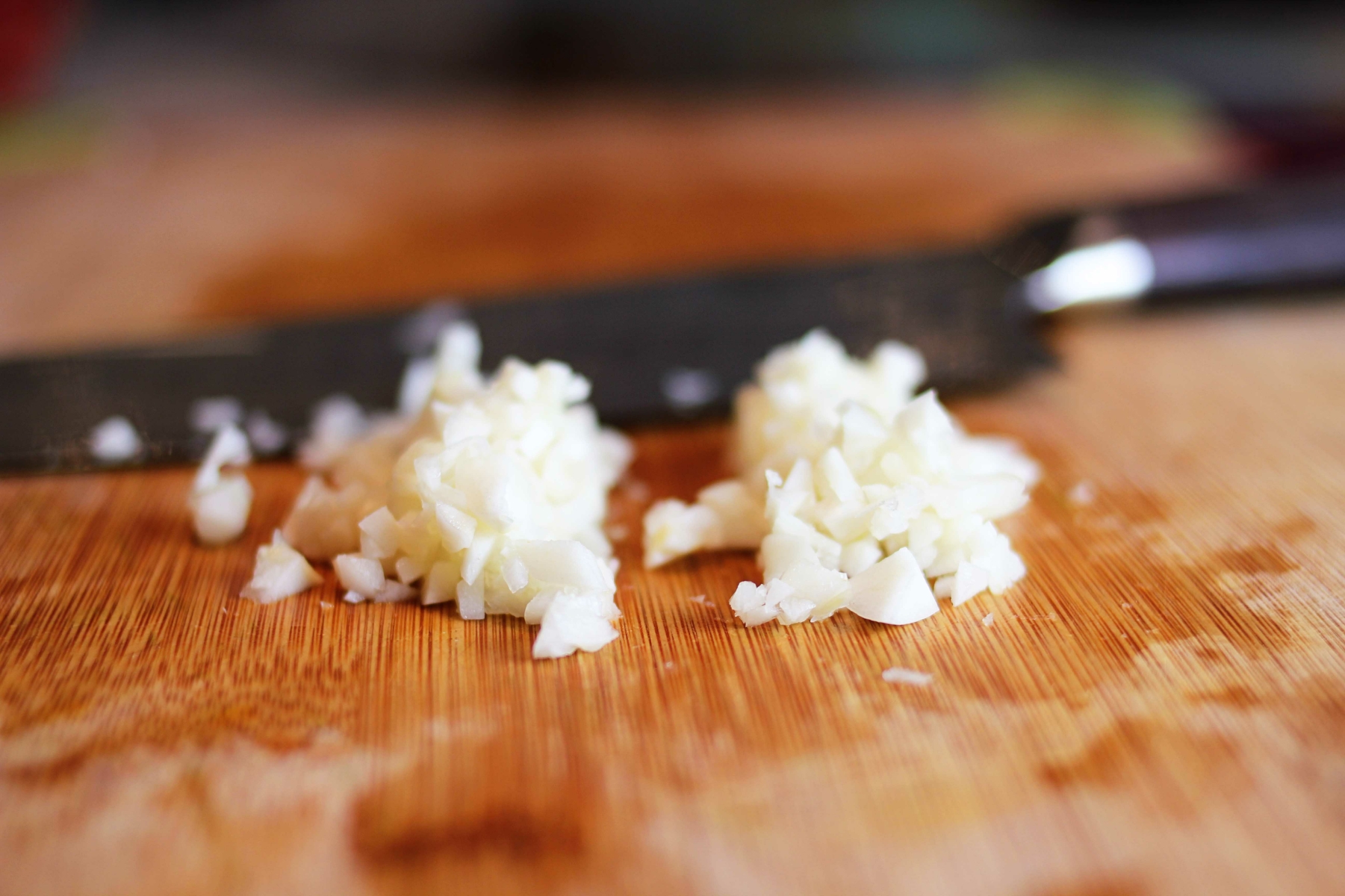 You cut up that one half a onion that's been in there for ever but somehow is still good. And that wrinkled ass garlic. 